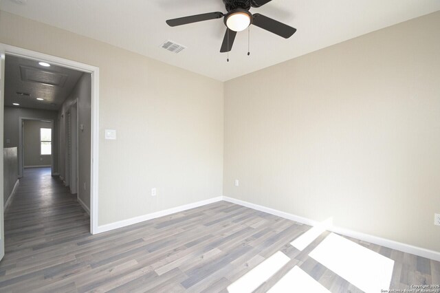 165 N San Felipe, San Antonio, TX 78237 - empty room with wood finished floors, attic access, and ceiling fan