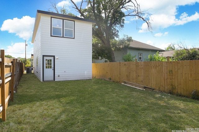 165 N San Felipe, San Antonio, TX 78237 - rear view of house with a fenced backyard