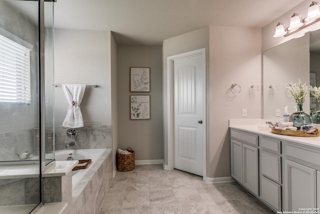6838 Dashmoor Crk, San Antonio, TX 78244 - bathroom featuring vanity, a garden tub, and a shower with shower door