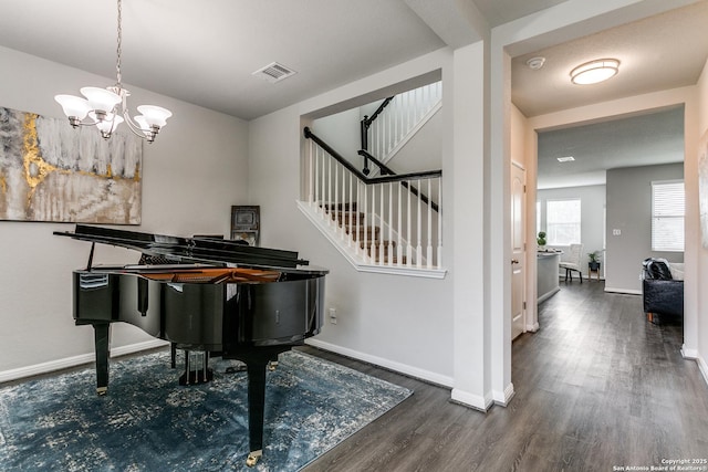 6838 Dashmoor Crk, San Antonio, TX 78244 - sitting room featuring wood finished floors, a chandelier, and stairway