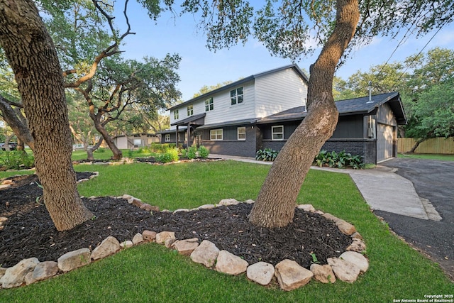 408 Meadowbrook, Hollywood Park, TX 78232 - view of side of home with brick siding