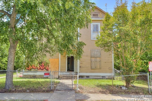 310 E Carson, San Antonio, TX 78208 - obstructed view of property with a fenced front yard and a gate