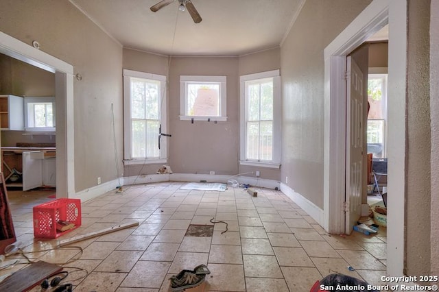 310 E Carson, San Antonio, TX 78208 - foyer featuring plenty of natural light, ceiling fan, crown molding, and light tile patterned floors