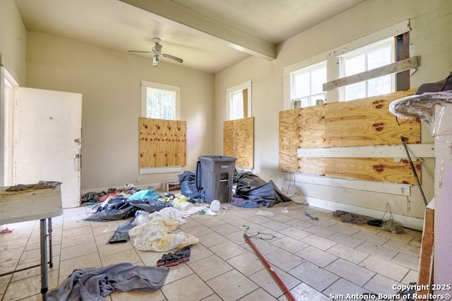 310 E Carson, San Antonio, TX 78208 - tiled empty room featuring plenty of natural light, beamed ceiling, and ceiling fan