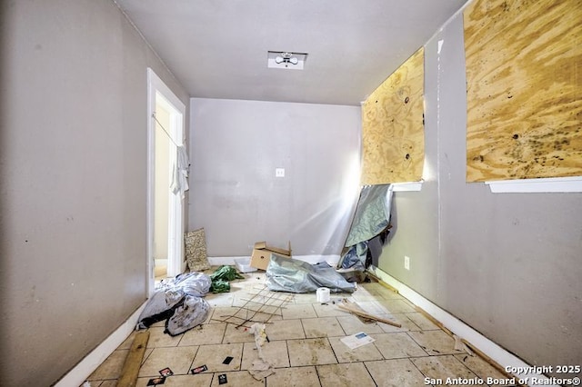 310 E Carson, San Antonio, TX 78208 - bathroom featuring baseboards