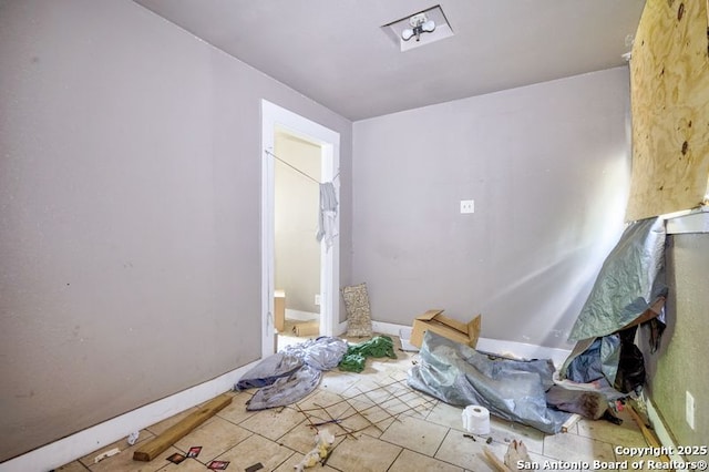 310 E Carson, San Antonio, TX 78208 - unfurnished room featuring tile patterned flooring