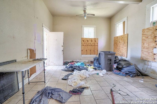 310 E Carson, San Antonio, TX 78208 - empty room with tile patterned flooring and a ceiling fan