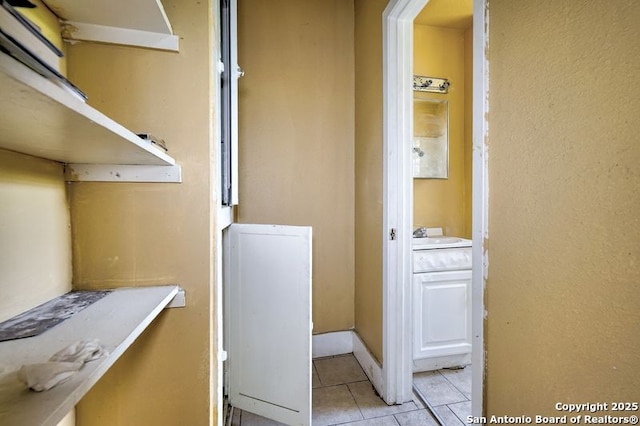 310 E Carson, San Antonio, TX 78208 - spacious closet featuring light tile patterned floors