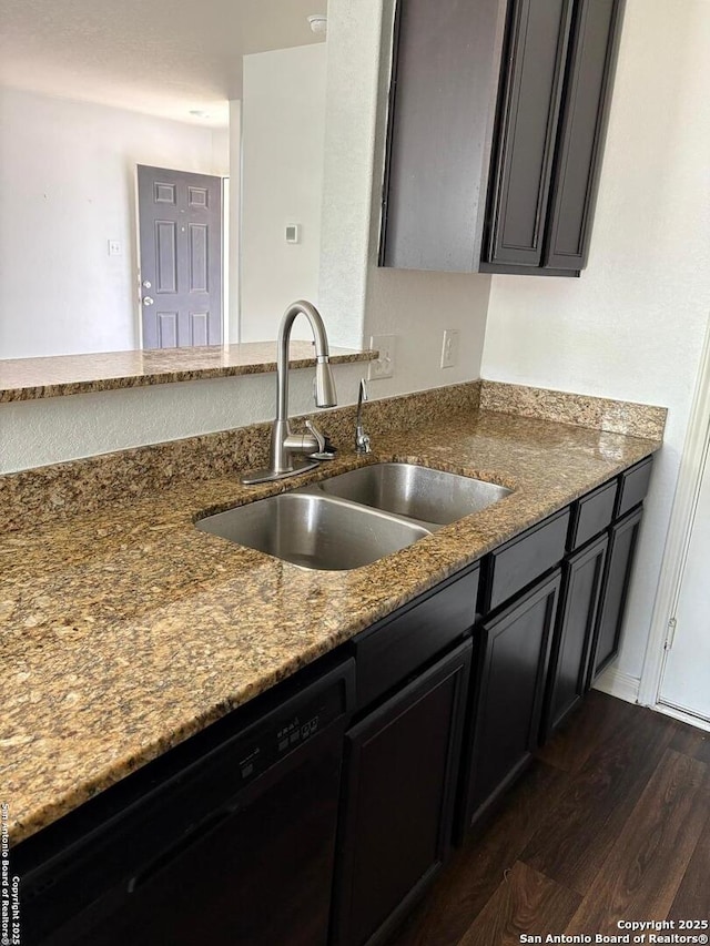 6135 Lakefront, San Antonio, TX 78222 - kitchen with black dishwasher, stone counters, and dark wood finished floors