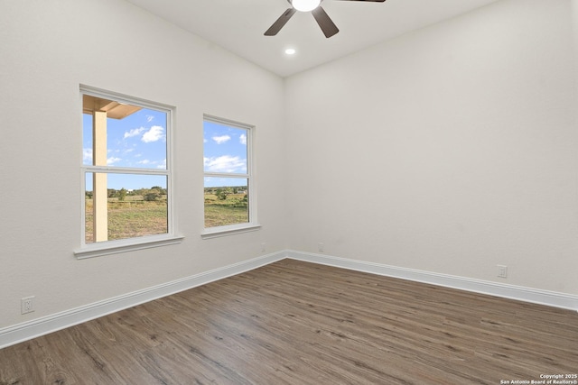 149 Camino Verde Ln, Vernia, TX 78121 - unfurnished room featuring dark wood-style floors, a ceiling fan, and recessed lighting
