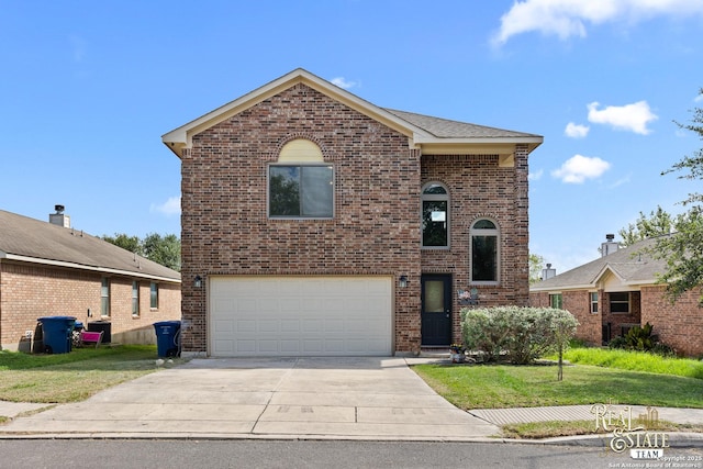 6027 Still Mdw, San Antonio, TX 78222 - view of front of house featuring an attached garage, brick siding, driveway, and a front lawn