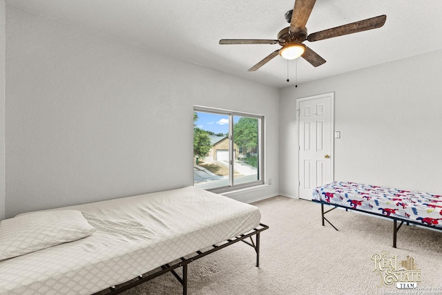 6027 Still Mdw, San Antonio, TX 78222 - bedroom with light colored carpet and a ceiling fan