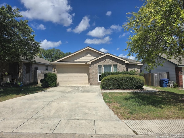 623 Coral Hbr, San Antonio, TX 78251 - ranch-style home with an attached garage, brick siding, and driveway
