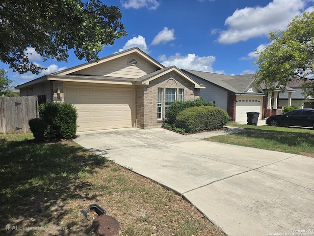 623 Coral Hbr, San Antonio, TX 78251 - single story home featuring an attached garage, concrete driveway, and brick siding