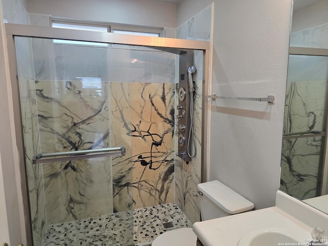 623 Coral Hbr, San Antonio, TX 78251 - bathroom featuring vanity and a marble finish shower