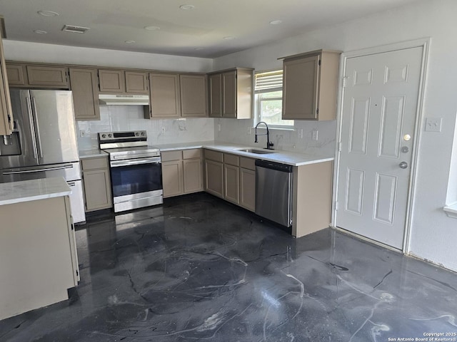 623 Coral Hbr, San Antonio, TX 78251 - kitchen with stainless steel appliances, under cabinet range hood, light countertops, decorative backsplash, and recessed lighting