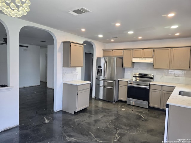 623 Coral Hbr, San Antonio, TX 78251 - kitchen featuring stainless steel appliances, backsplash, arched walkways, recessed lighting, and under cabinet range hood