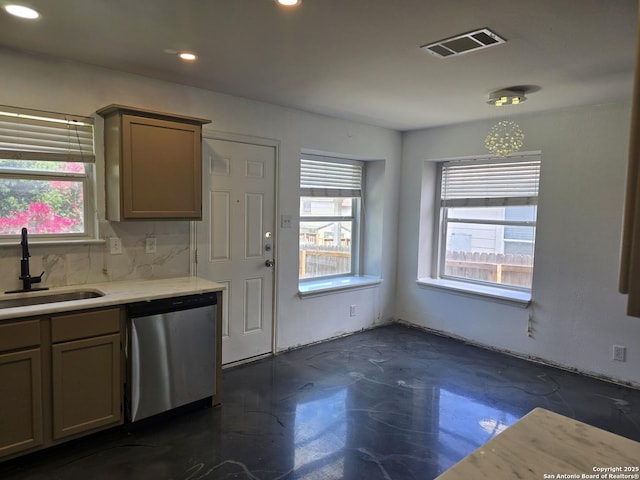 623 Coral Hbr, San Antonio, TX 78251 - kitchen with stainless steel dishwasher, finished concrete floors, light countertops, recessed lighting, and backsplash