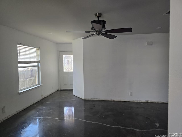 623 Coral Hbr, San Antonio, TX 78251 - unfurnished room with finished concrete floors and a ceiling fan