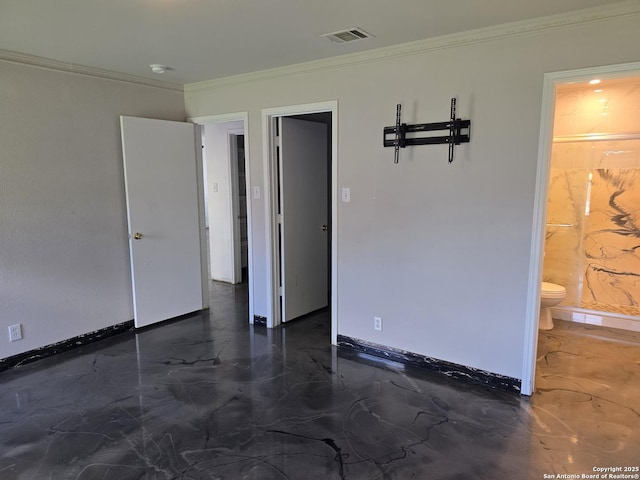 623 Coral Hbr, San Antonio, TX 78251 - unfurnished bedroom featuring ornamental molding, connected bathroom, and marble finish floors