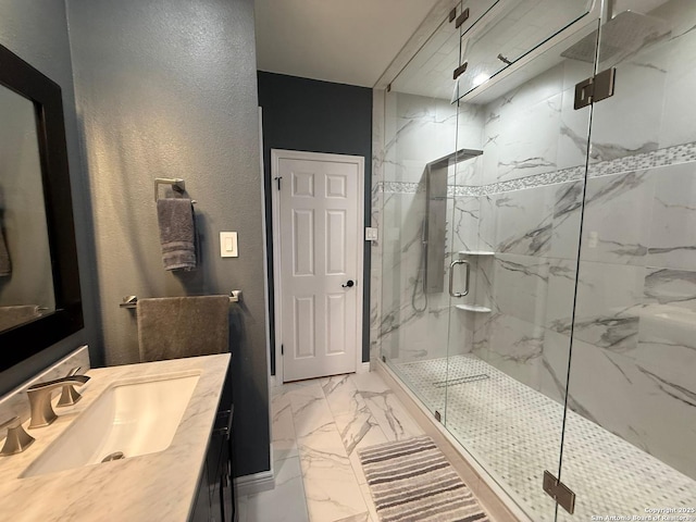 13011 Vidorra Vis, San Antonio, TX 78216 - bathroom with marble finish floors, a marble finish shower, and vanity