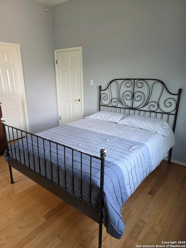 13011 Vidorra Vis, San Antonio, TX 78216 - bedroom featuring wood finished floors