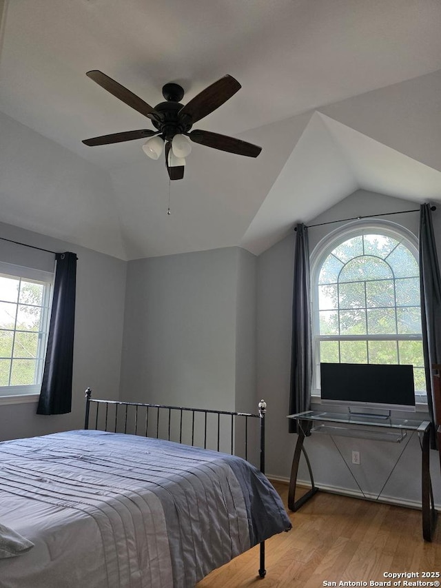 13011 Vidorra Vis, San Antonio, TX 78216 - bedroom with lofted ceiling, wood finished floors, and ceiling fan