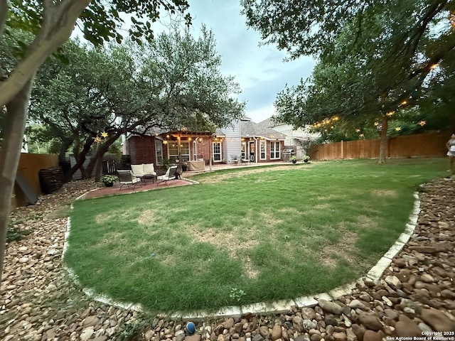 13011 Vidorra Vis, San Antonio, TX 78216 - fenced backyard featuring a patio