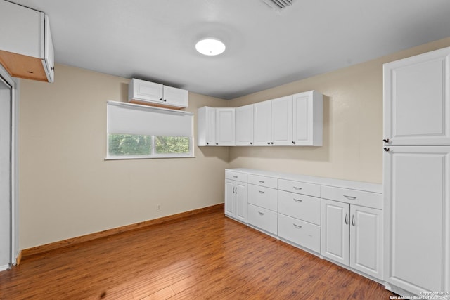 6033 Cammie, Leon Valley, TX 78238 - empty room featuring light wood-type flooring and baseboards