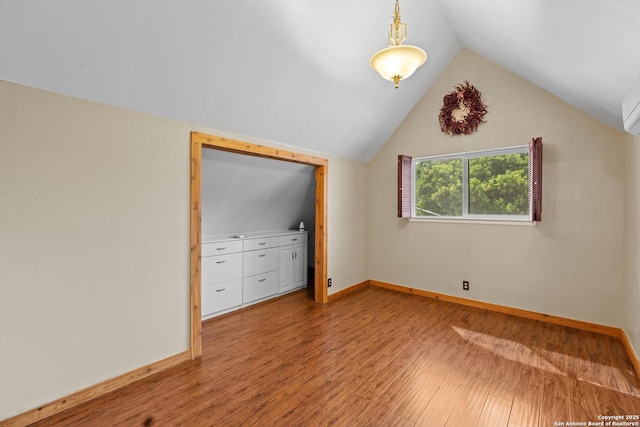 6033 Cammie, Leon Valley, TX 78238 - additional living space with light wood finished floors and vaulted ceiling