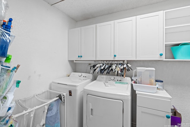 6033 Cammie, Leon Valley, TX 78238 - laundry room featuring cabinet space and independent washer and dryer