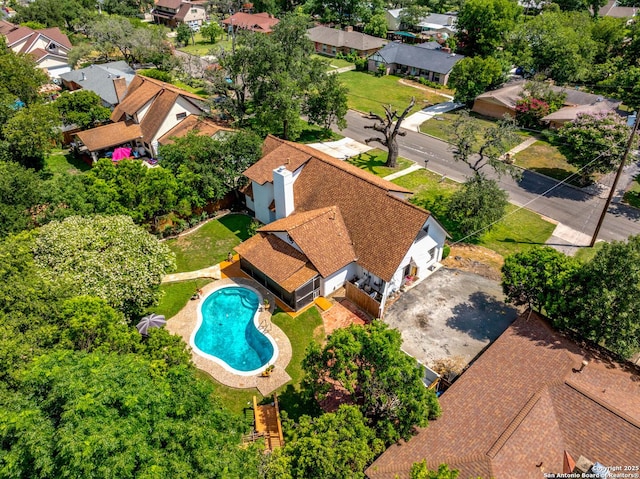 6033 Cammie, Leon Valley, TX 78238 - aerial perspective of suburban area featuring a pool area