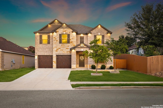 244 Landmark Way, Cibolo, TX 78108 - view of front of home featuring an attached garage, driveway, stone siding, and brick siding