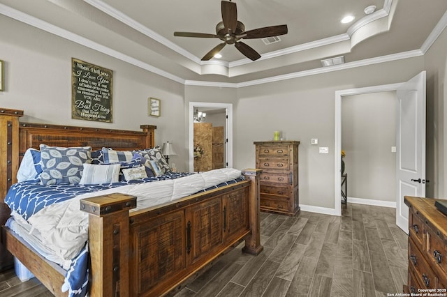 1117 Provence Pl, New Braunfels, TX 78132 - bedroom featuring a raised ceiling, dark wood-style floors, crown molding, a ceiling fan, and connected bathroom
