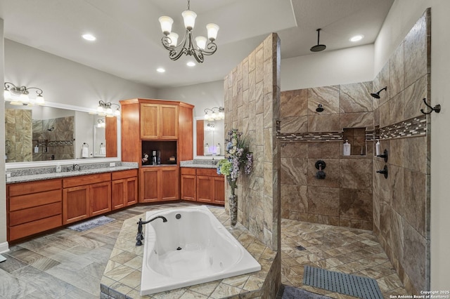 1117 Provence Pl, New Braunfels, TX 78132 - full bath featuring a tub with jets, a chandelier, a walk in shower, vanity, and recessed lighting