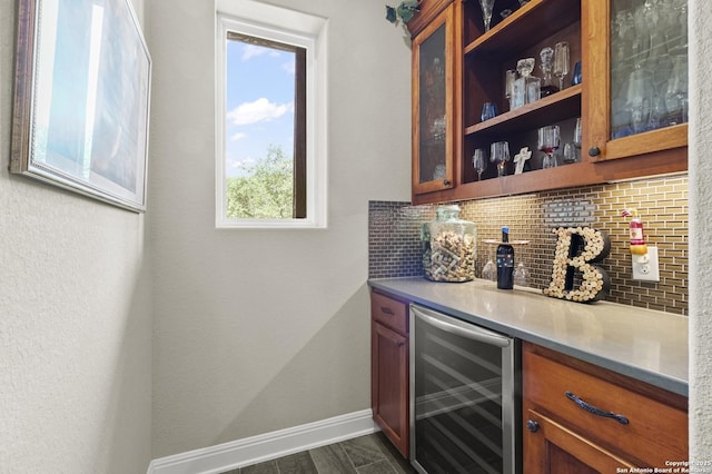 1117 Provence Pl, New Braunfels, TX 78132 - indoor dry bar featuring wine cooler and tasteful backsplash