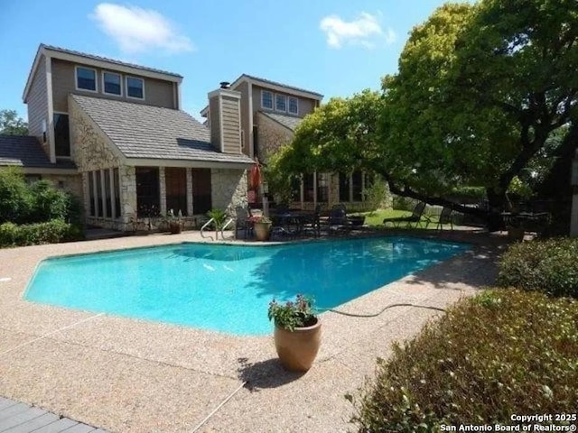 405 Short Circuit Unit 1, Horseshoe Bay, TX 78657 - outdoor pool featuring a patio