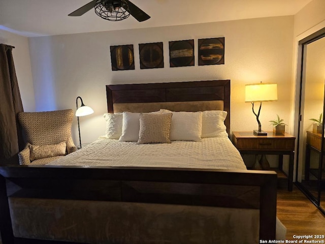 405 Short Circuit Unit 1, Horseshoe Bay, TX 78657 - bedroom featuring wood finished floors and ceiling fan