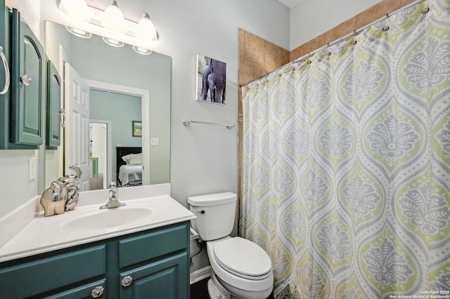15315 Flying Cir, San Antonio, TX 78023 - bathroom with vanity, connected bathroom, and curtained shower