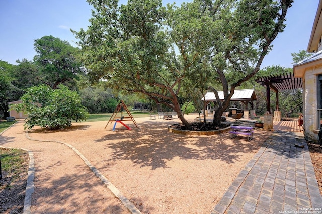 15315 Flying Cir, San Antonio, TX 78023 - view of yard with a pergola