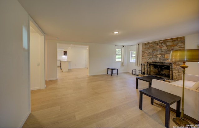 25711 Principles Vw, San Antonio, TX 78255 - living area featuring light wood-style floors and a fireplace