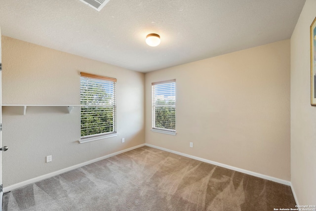 17132 Bandera Rd, Helotes, TX 78023 - empty room with carpet flooring and baseboards