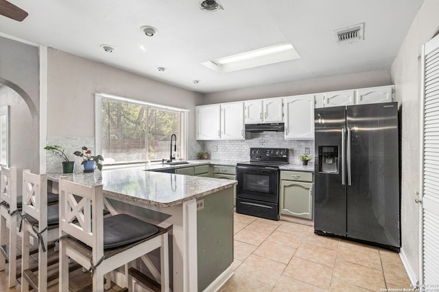 3702 Pipers Fld, San Antonio, TX 78251 - kitchen featuring refrigerator with ice dispenser, electric range, a peninsula, range hood, and tasteful backsplash