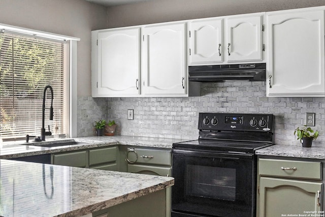 3702 Pipers Fld, San Antonio, TX 78251 - kitchen with electric range, under cabinet range hood, decorative backsplash, white cabinets, and light stone counters
