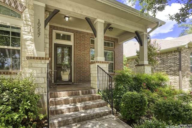 10657 Foxen Way, Helotes, TX 78023 - doorway to property with brick siding and a porch
