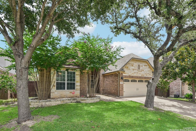 24906 Cloudy Crk, San Antonio, TX 78255 - view of front of house with an attached garage, driveway, stone siding, and a front lawn