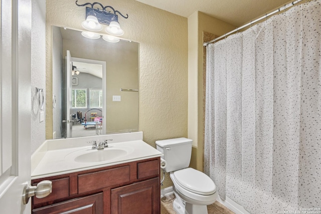 24906 Cloudy Crk, San Antonio, TX 78255 - bathroom with a textured wall, vanity, and a shower with curtain