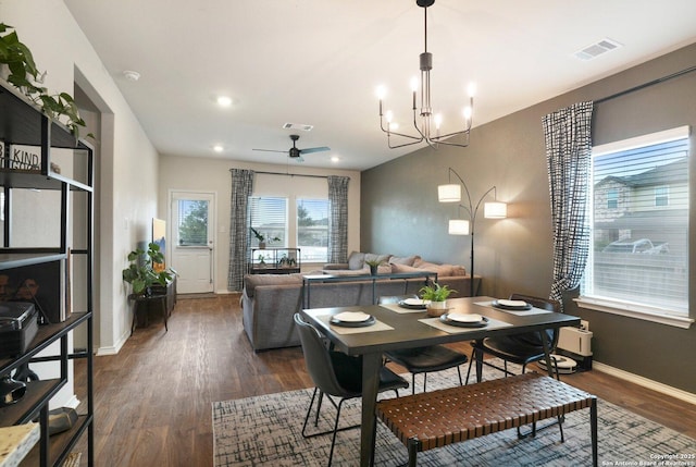 13874 Siltstone, San Antonio, TX 78253 - dining room with dark wood finished floors, a ceiling fan, a chandelier, and recessed lighting
