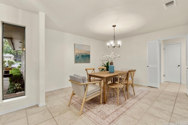 14310 Fox Fire Ln, San Antonio, TX 78231 - dining room with light tile patterned floors and a chandelier