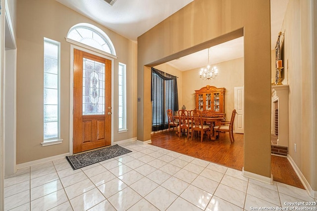 26304 Tiffnilee, San Antonio, TX 78255 - foyer with plenty of natural light, a chandelier, and a towering ceiling